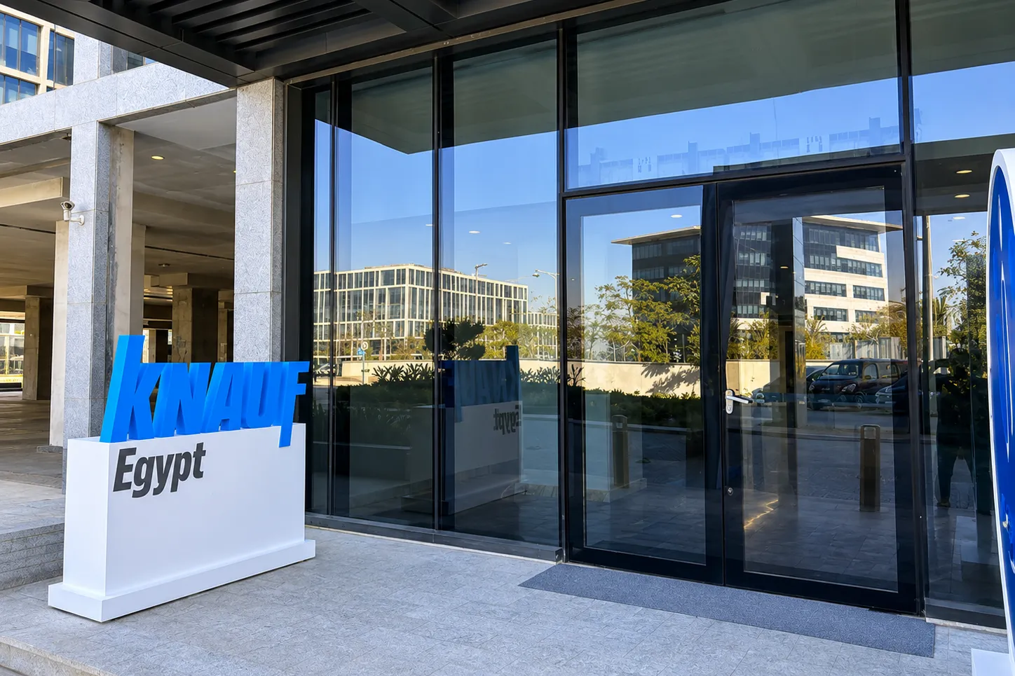 Wide exterior view of a modern commercial office b result